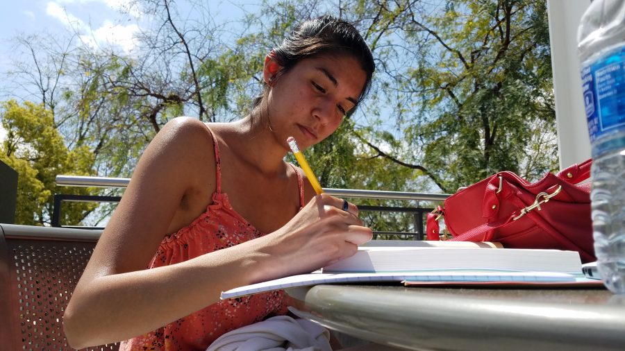 A Mt. SAC student studies from their textbook. Photo by Melody Waintal/SAC Media.