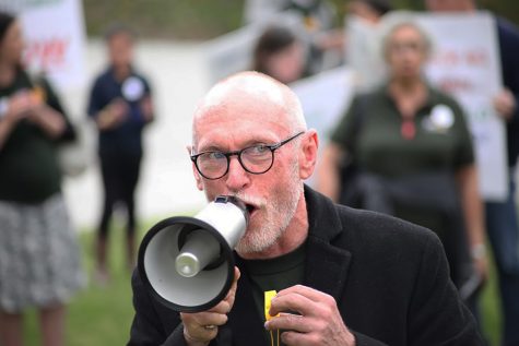 Gary Enke leads a march on the lawn of the Founder's Hall in front of Mt. SAC in Walnut, California on May 8, 2019. Mt. SAC Staff and Faculty had been protesting to prevent the change in healtcare plans with Enke and others leading protests to keep their health care plans. Photo credit: Abraham Navarro/SAC.Media.
