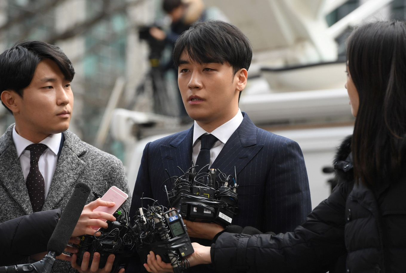 Seungri on a press conference over criminal allegations