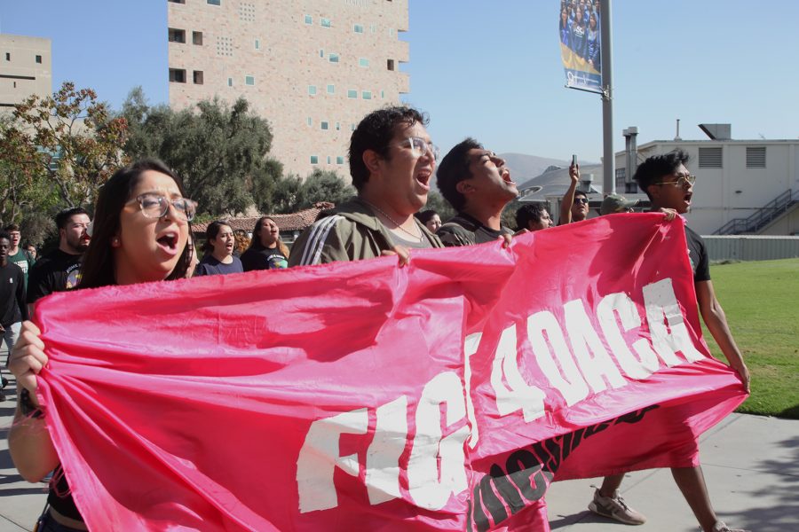 Students march in front of Cal Poly Pomona's iconic CLA building. Photo credit: Abraham Navarro/SAC.Media.
