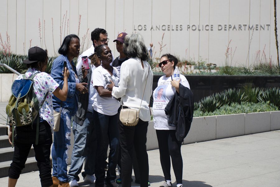 Lisa Hines, mother of Wakiesha Wilson (center) confronts Los Angeles Police Commissioner Cynthia McClain -Hill in front of LAPD Headquarters on Tuesday, May 8. Photo Credit: Hernandez Coke/SAC.Media