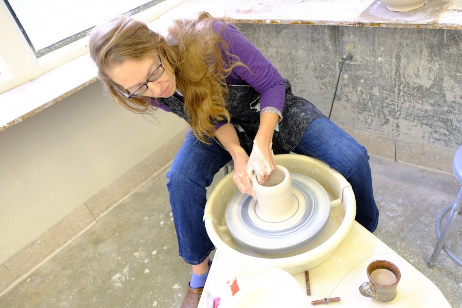 Cj Jilek, ceramic artist and professor, begins work on a bowl in the Mt. SAC ceramics classroom. Photo Credit: Doug de Wet/SAC.Media