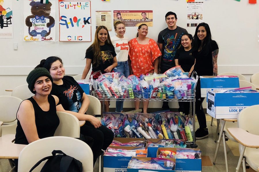 Culture Shock Club members after a recent collection drive collecting toiletries for women survivors of domestic abuse. They collected over 209 kits. 