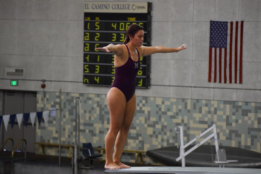 Valerie+Villar+sets+up+on+the+3-meter+board+for+her+back+dive+on+Saturday%2C+April+14+at+El+Camino+College.+Photo+Credit%3A+Melody+Waintal%2FSAC.Media