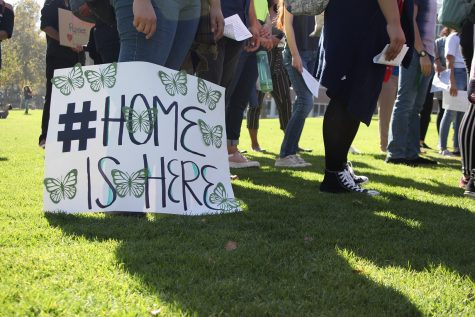 Students listen to leaders and lawyers speak about the DACA processes after a march at Cal Poly Pomona. Photo credit: Abraham Navarro/SAC.Media.