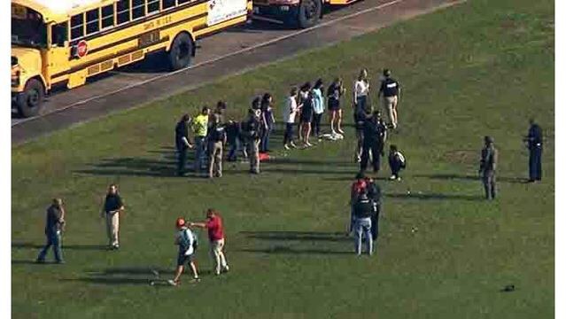 Students of Santa Fe High School evacuating campus after a school shooting. Photo Credit: WKRN