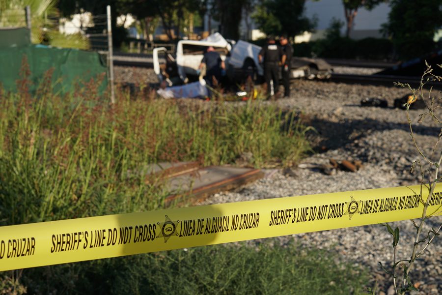 Police tape surrounds the accident scene as the coroner, police and towing crew work in the background on May 9 in Hacienda Heights. Photo credit: Joshua Sanchez/SAC.Media.