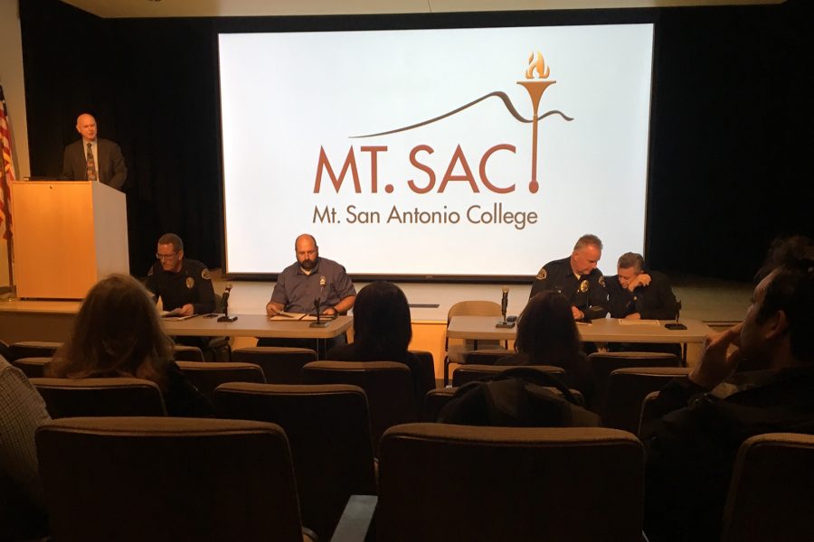 President Bill Scroggins reads question to the panel at the first town hall meeting on Nov. 29. Photo by Nicole Crawford/SAC Media.