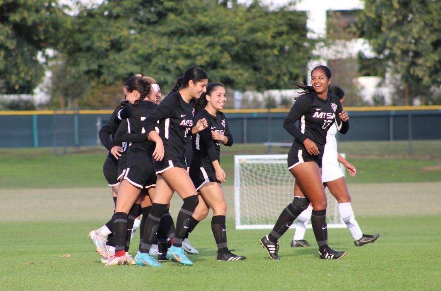 The Mounties celebrate after scoring a goal against Rio Hondo Roadrunners in the SSC Tournament semifinal.