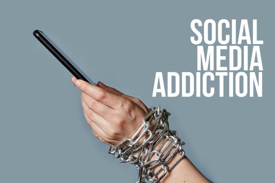 Social media addiction. Via Marco Verch Professional Photographer/Flickr.