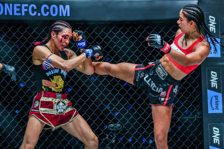 Allycia Hellen Rodrigues throws a vicious strike as Janet Todd does her best to defend during One Fight Night 8 (via ONE Championship).