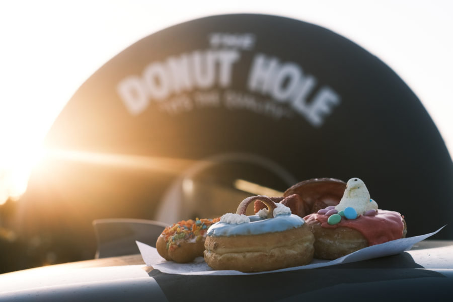 Four donuts from four establishments gazing upon a sun-kissed California landmark.