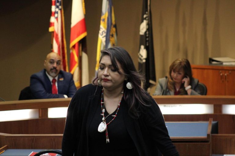 Gabrielino-Shoshone spiritual leader Jamie Rocha walks away after her public comment at the March 21 council meeting.