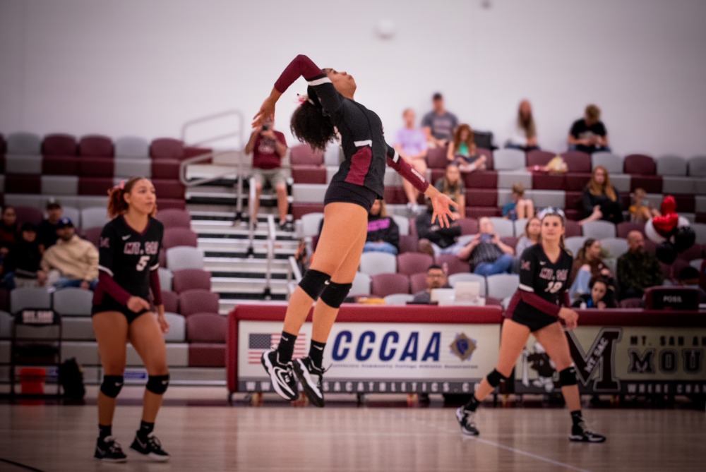 Freshman+outside+hitter+Andrea+Brewer+%2810%29+running+a+pipe+back+row+attack+with+teammates+Melissa+Polich+%2818%29+and+Zyra+Green+%285%29+maintaining+their+base+defense.%C2%A0