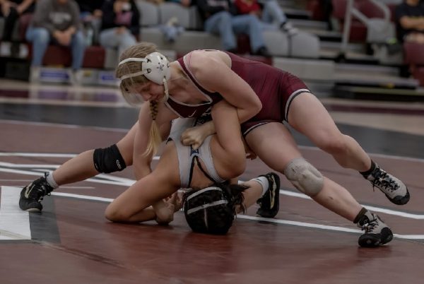 During SACs inaugural home opener of womens wrestling against the East Los Angeles Huskies, Irwin would win her first match at 128 lbs. against freshman Ariana Camacho.   