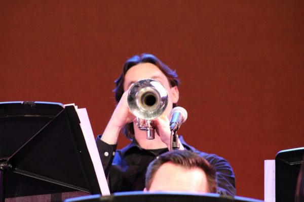 Noah Taylor playing the trumpet. 