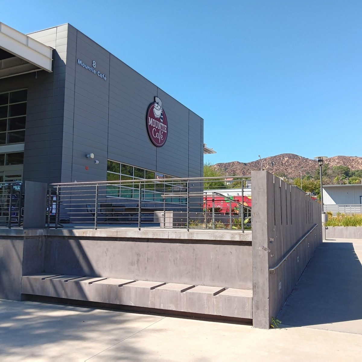 "Joe Mountie" signs remain visible on campus as seen on the student cafe. 