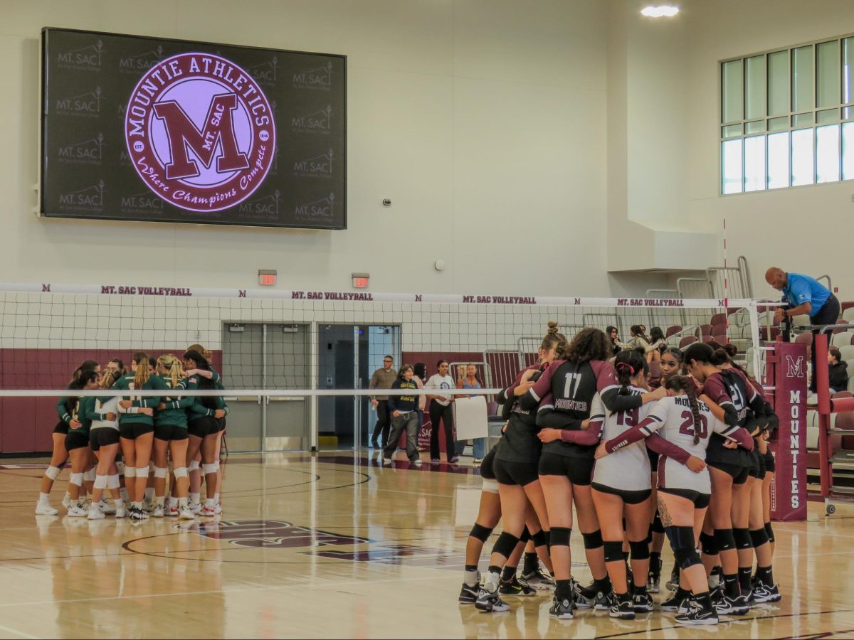 SAC Women's Volleyball huddles up before the match up against Golden West