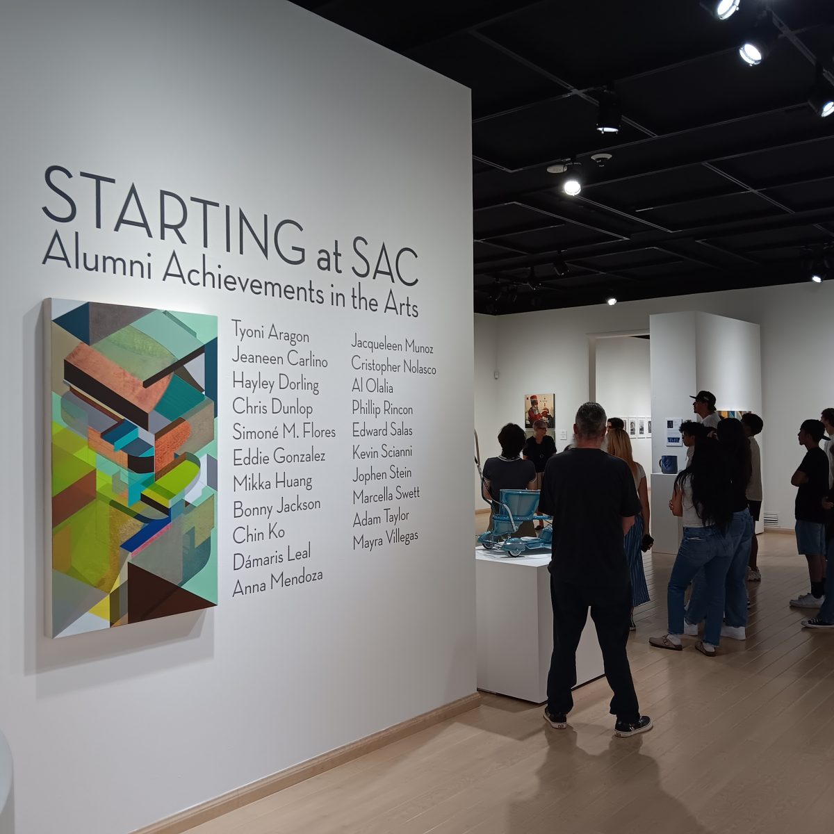 An art history class tours the Diana Berger Art Gallery.