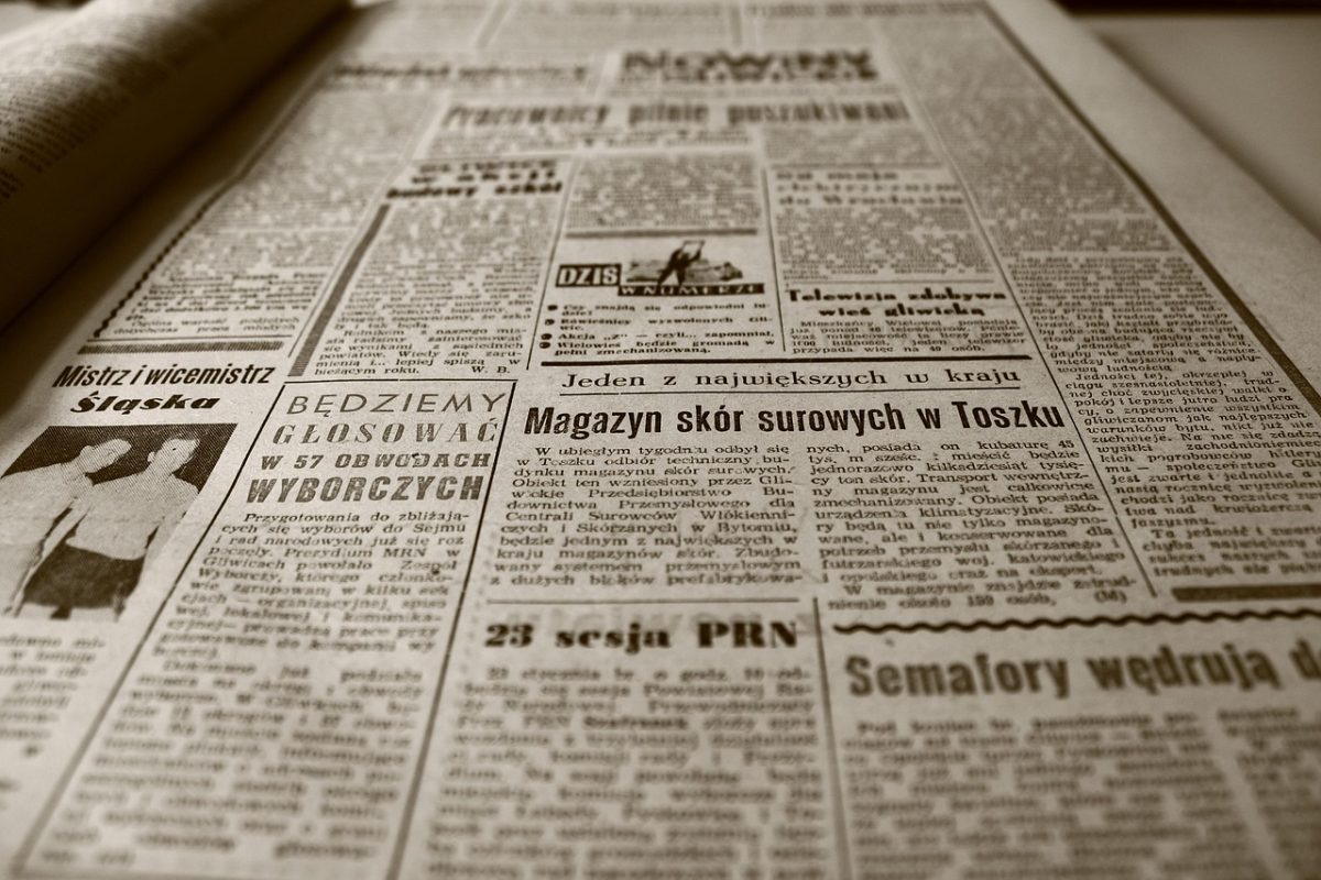 Print newspaper with stories filling the page.