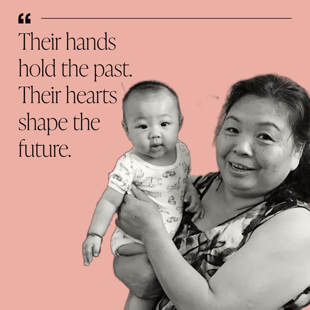 Liang Liping holding her granddaughter when she was a baby.