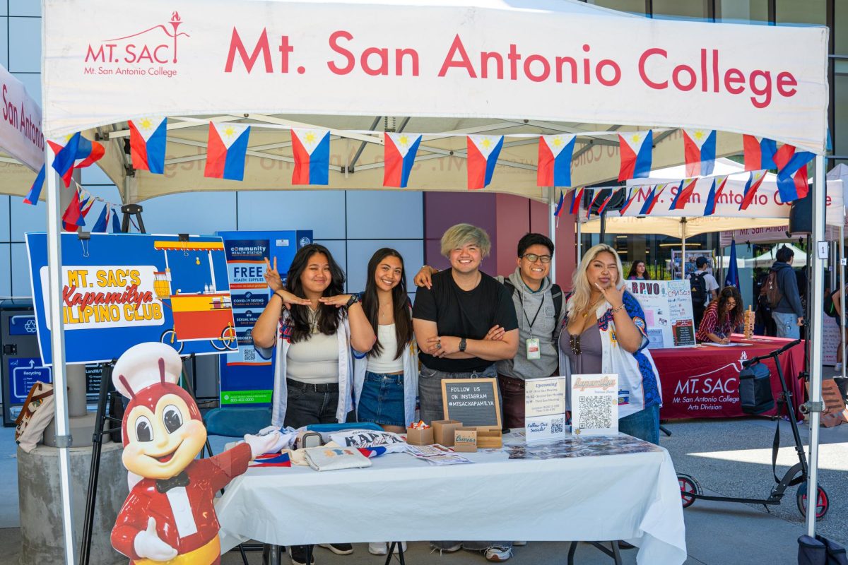 Members of Mt. SAC’s Kapamilya Club pose in front of their booth during Join-a-Club Week on Sept. 9.