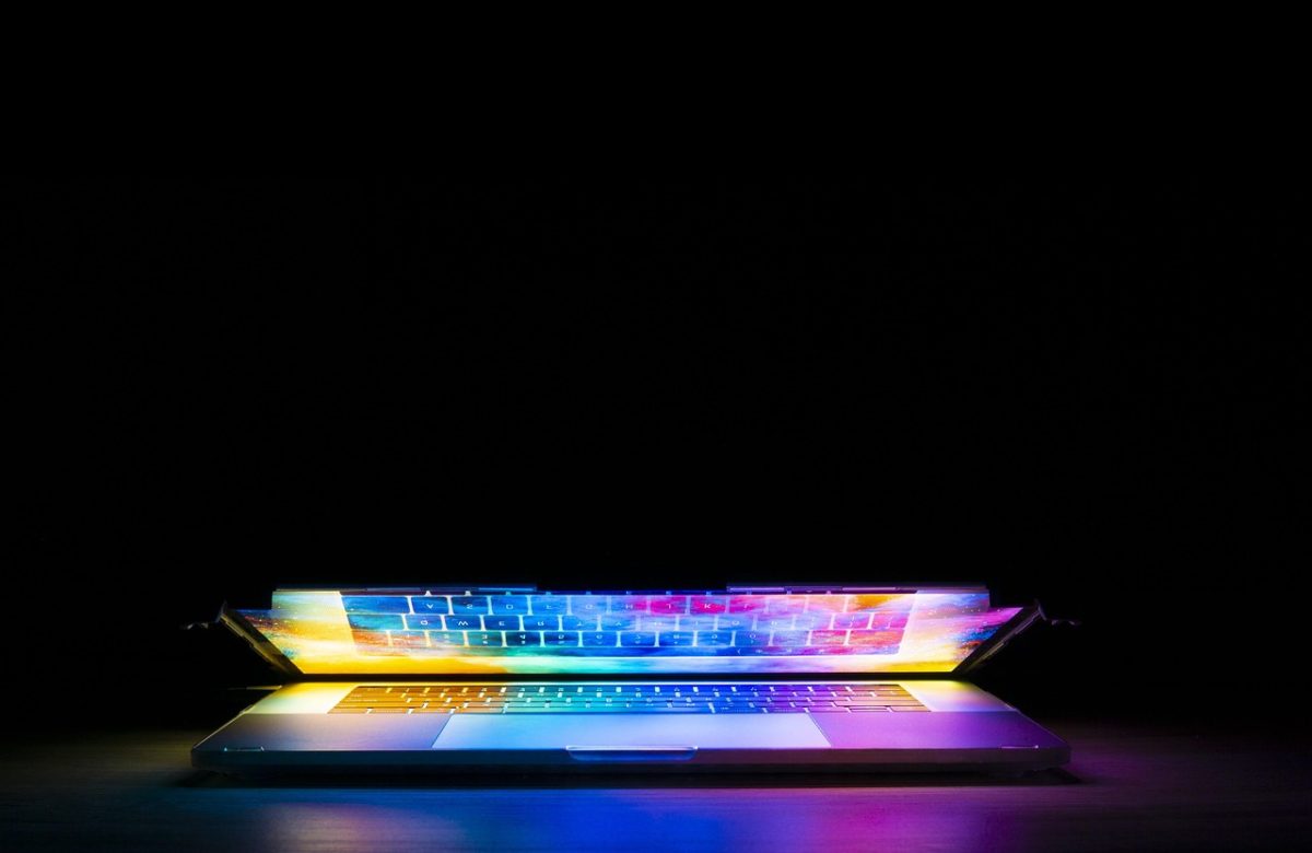 MacBook Pro turned on displaying colorful screen