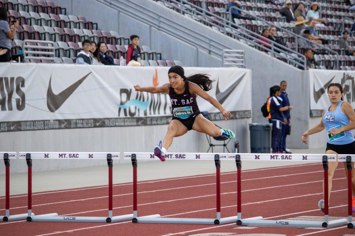 Sophomore Ashanti Cabrera Estrada competes during the women's 400 meter hurdle. 