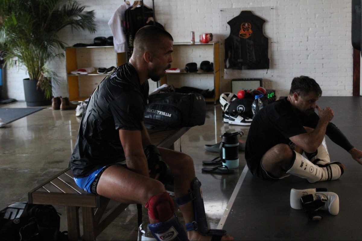 Chris Mecate taking a break between rounds with Austin Algren by his side.